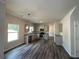 Bright kitchen boasts stainless steel appliances and gray cabinets at 142 Tye St, Stockbridge, GA 30281
