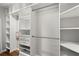 Walk-in closet with custom shelving and ample storage space for organization at 1744 Habershal Nw Dr, Atlanta, GA 30318