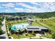 Aerial view of a community pool with a cabana and lush landscaping at 1744 Habershal Nw Dr, Atlanta, GA 30318