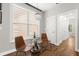Cozy dining area with a stylish bar cart and warm natural light at 1744 Habershal Nw Dr, Atlanta, GA 30318