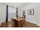 Dining room with elegant chandelier, and view to kitchen at 1744 Habershal Nw Dr, Atlanta, GA 30318