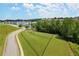 Community dog park with green space and play area at 1744 Habershal Nw Dr, Atlanta, GA 30318