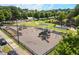Community playground with various play structures and shaded areas at 1744 Habershal Nw Dr, Atlanta, GA 30318