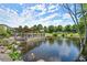 A serene pond featuring a gazebo, with rock details in a community at 1744 Habershal Nw Dr, Atlanta, GA 30318