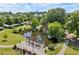 Scenic pond with a fountain and pergola in a lush green community at 1744 Habershal Nw Dr, Atlanta, GA 30318