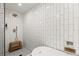 Bright bathroom with a walk-in shower, white subway tile, and bronze shower fixtures at 1744 Habershal Nw Dr, Atlanta, GA 30318
