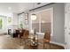 Cozy living room with hardwood floors, a decorative fireplace, and a curated bar area at 1744 Habershal Nw Rd, Atlanta, GA 30318