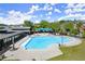 Aerial view of the community pool and recreation area on a beautiful sunny day at 1744 Habershal Nw Rd, Atlanta, GA 30318