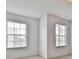 Light-filled bedroom featuring two windows that provide great natural light at 5661 Radford Loop, Fairburn, GA 30213