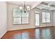 Dining area features hardwood floors and a view of the backyard at 5661 Radford Loop, Fairburn, GA 30213