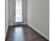 Room with hardwood floors and a door leading outside at 5661 Radford Loop, Fairburn, GA 30213