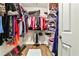 Walk-in closet with ample storage, wood floors, and a clean design at 1249 Francis Nw St, Atlanta, GA 30318
