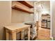 Kitchenette featuring a stainless steel range and floating wood shelves at 1249 Francis Nw St, Atlanta, GA 30318