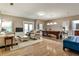 Spacious living room with a pool table, hardwood floors, and lots of natural light at 1249 Francis Nw St, Atlanta, GA 30318