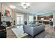 Spacious living room with hardwood floors, brick fireplace, and modern furnishings at 1249 Francis Nw St, Atlanta, GA 30318