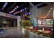 Enjoy the Puttshack venue, featuring a trendy exterior with vibrant lighting, dining, and bar access at 1249 Francis Nw St, Atlanta, GA 30318