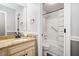 Clean and bright bathroom featuring a granite countertop vanity and a shower/tub combination at 4458 Trickum Ne Rd, Marietta, GA 30066