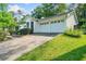 Charming home with a two-car garage and well-manicured lawn, offering curb appeal and convenient parking at 4458 Trickum Ne Rd, Marietta, GA 30066