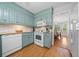 Well-lit kitchen with granite countertops, stainless steel appliances, and access to the dining room at 4458 Trickum Ne Rd, Marietta, GA 30066