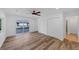 Bright, open bedroom with wood floors, double closets, ceiling fan and a sliding glass door to deck at 923 Smith Sw St, Atlanta, GA 30310