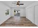 Bright, open bedroom with wood floors, double closets, ceiling fan and a sliding glass door to deck at 923 Smith Sw St, Atlanta, GA 30310