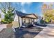 Charming home boasts a covered front porch and freshly mulched landscaping in a tranquil setting at 923 Smith Sw St, Atlanta, GA 30310