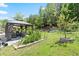 Spacious backyard featuring a stylish gazebo and lush green landscaping at 2125 Mina Lane Dr, Buford, GA 30518