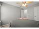 This bedroom offers natural light and neutral walls at 2125 Mina Lane Dr, Buford, GA 30518