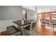 Open-concept dining area with elegant furnishings, connecting seamlessly to the inviting living space at 2125 Mina Lane Dr, Buford, GA 30518