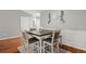 Stylish dining area showcasing a modern table set with comfortable seating and elegant decor at 2125 Mina Lane Dr, Buford, GA 30518