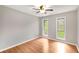 Bedroom featuring hardwood floors and lots of natural light at 2340 Beaver Ruin Rd # 68, Norcross, GA 30071