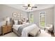 Tastefully furnished bedroom with carpet, neutral colors and lots of natural light at 2340 Beaver Ruin Rd # 68, Norcross, GA 30071