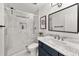 This bathroom features a glass shower with a bench and a vessel sink on a vanity at 2835 Channing Way, Cumming, GA 30040
