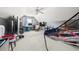 Spacious bonus room with a ceiling fan, ping pong table and multi-sport net at 2835 Channing Way, Cumming, GA 30040