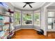 Cozy breakfast nook with bay window, hardwood floors, and views of the backyard at 2835 Channing Way, Cumming, GA 30040