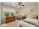 Bedroom offers natural light with light colored walls, carpet, and furniture at 5107 Old Chestnut Ct, Woodstock, GA 30188