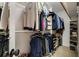 Large walk-in closet features ample storage space and closet rod for organization at 5107 Old Chestnut Ct, Woodstock, GA 30188