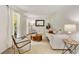 Inviting living room with natural light and neutral décor, perfect for relaxing at 5107 Old Chestnut Ct, Woodstock, GA 30188