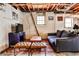 Finished basement with a sofa, TV, painted furniture and rug, offering a cozy living space at 1082 Greenbriar Cir, Decatur, GA 30033