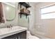 Updated bathroom with a sleek vanity, modern fixtures, and a glass-enclosed shower at 1082 Greenbriar Cir, Decatur, GA 30033