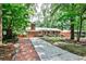 Charming single-story brick home with well-maintained front yard and long driveway at 1082 Greenbriar Cir, Decatur, GA 30033