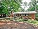 Charming single-story brick home with well-maintained front yard and driveway at 1082 Greenbriar Cir, Decatur, GA 30033