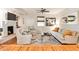 Comfortable living room with a fireplace, built-in bookshelves, ceiling fan, and comfortable neutral furnishings at 1082 Greenbriar Cir, Decatur, GA 30033