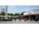 Exterior view of the Toco Hills Shopping Center, featuring a variety of businesses at 1082 Greenbriar Cir, Decatur, GA 30033