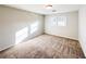 Bright bedroom features a large window, neutral carpet, and a clean, minimalist design at 110 Randomwood Way, Alpharetta, GA 30022