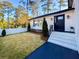 Charming front porch with a decorative fence and manicured landscaping at 110 Randomwood Way, Alpharetta, GA 30022