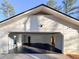 Spacious garage with high ceilings and convenient access to the interior of the home at 110 Randomwood Way, Alpharetta, GA 30022