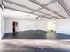 Large garage with ample space, lighting, and convenient access points at 110 Randomwood Way, Alpharetta, GA 30022