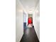 Hallway features neutral tones and access to garage at 110 Randomwood Way, Alpharetta, GA 30022