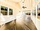 Covered porch with ample space for relaxing and enjoying the outdoors at 110 Randomwood Way, Alpharetta, GA 30022